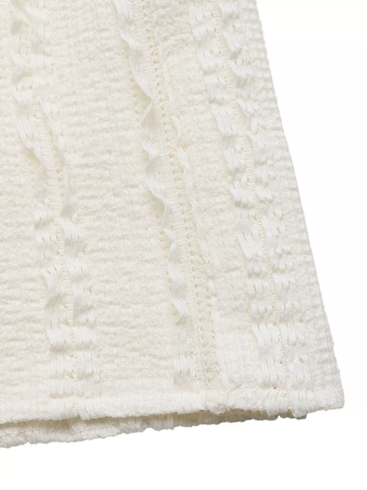 Ivory textured midi skirt fabric with raised pattern and vertical woven detail
