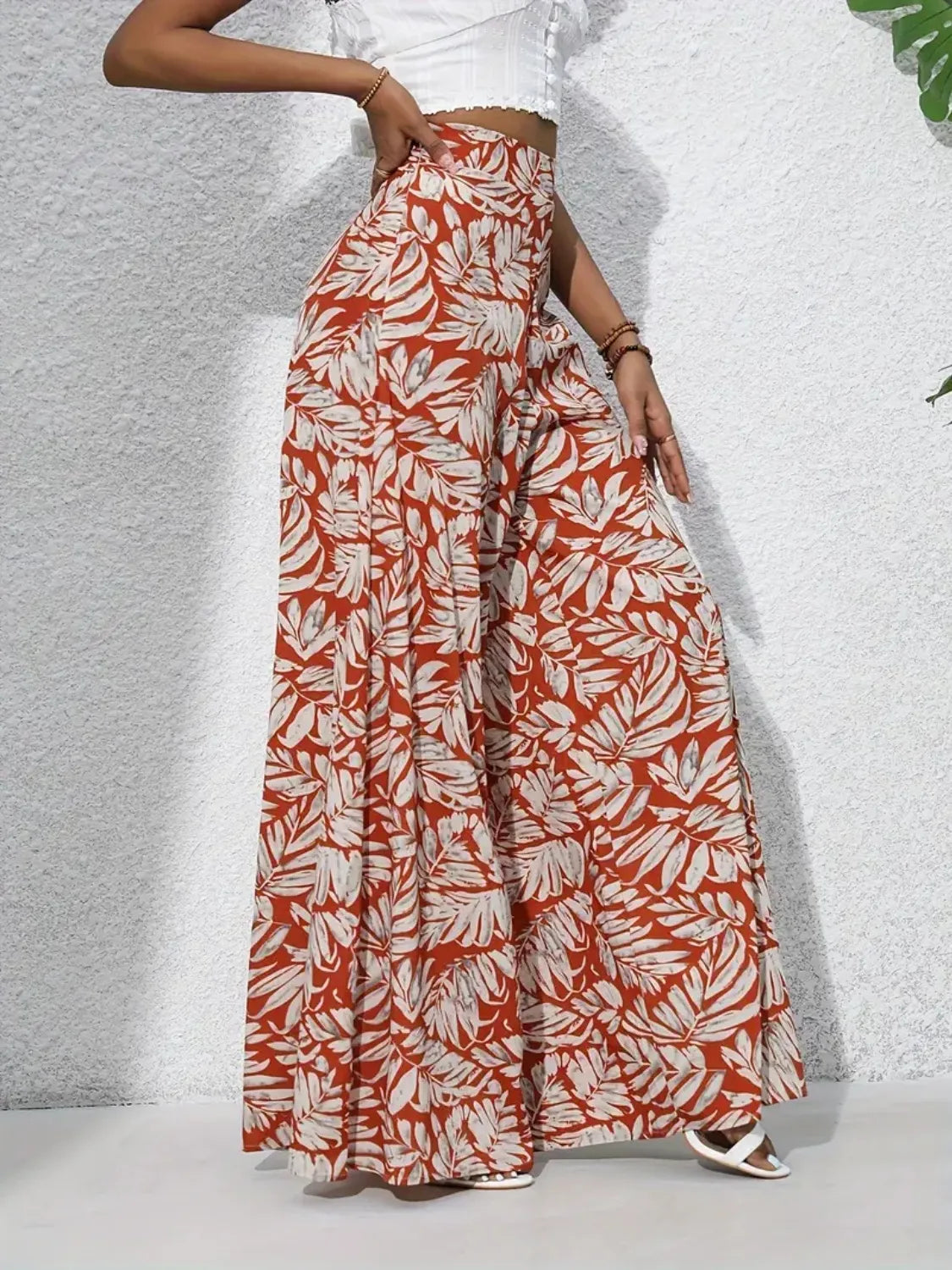 Printed high-waist wide-leg pants, red and white leaf print, tiered wide legs