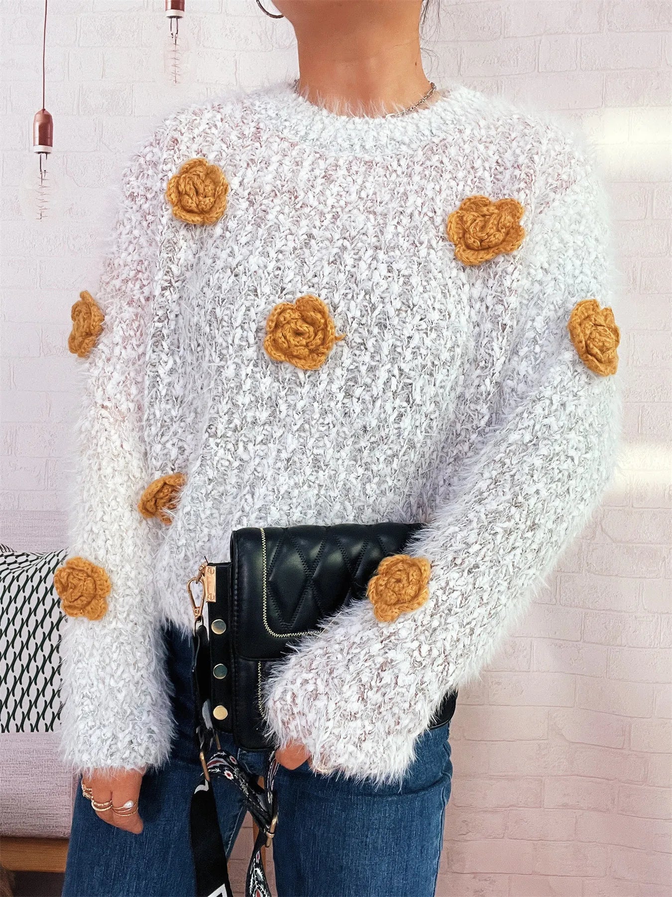 Flower-embellished round-neck sweater, fuzzy white knit with orange rosette appliques