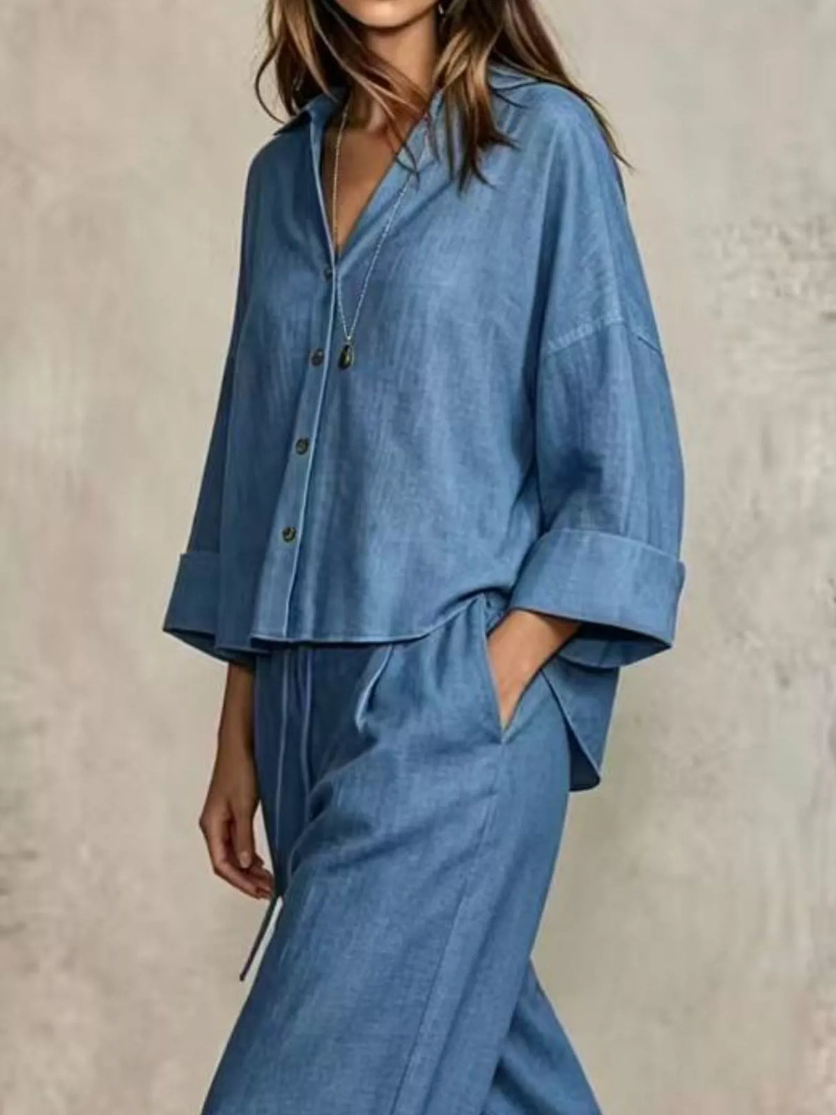 Blue wide leg button-down shirt and pants set, loose fit with cuffed sleeves