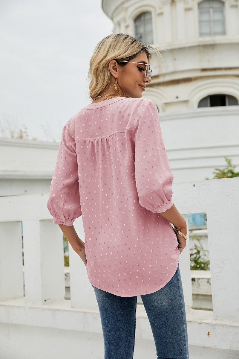 Blush pink Swiss-dot blouse with gathered yoke and 3/4 puff sleeves, back view