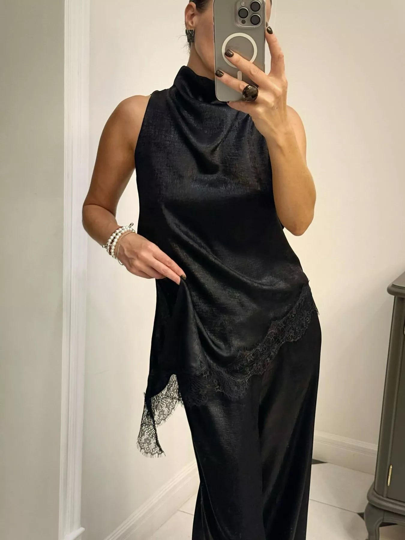 Cedar & Moore High Neck Lace Trim Cami in black satin with lace hem and asymmetrical detail