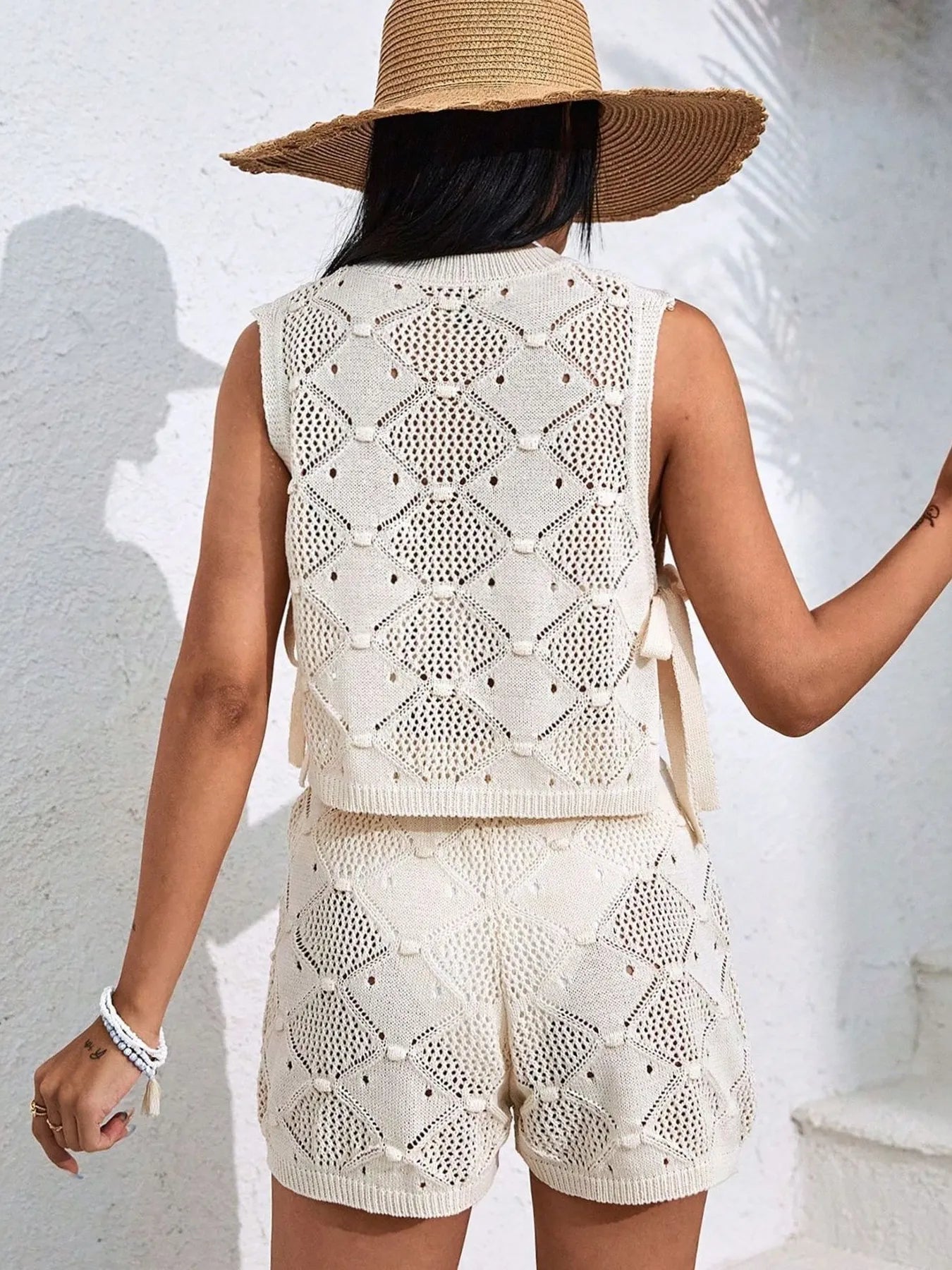 Apricot diamond-pattern sleeveless knit set with drawstring shorts, back view