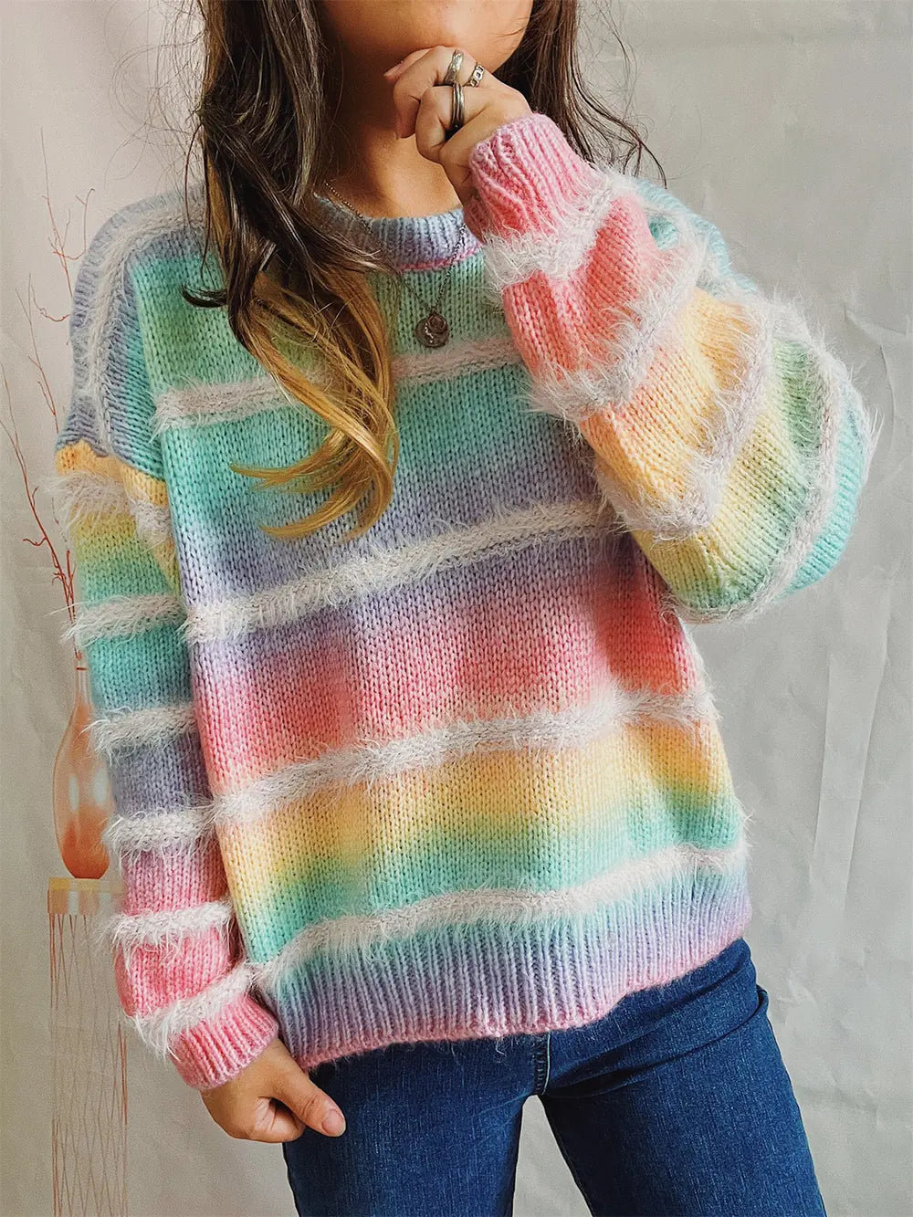 Striped round-neck long-sleeve sweater with aqua, pink, yellow, and lavender stripes