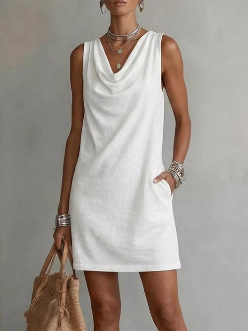 White sleeveless cowl-neck mini dress with draped neckline