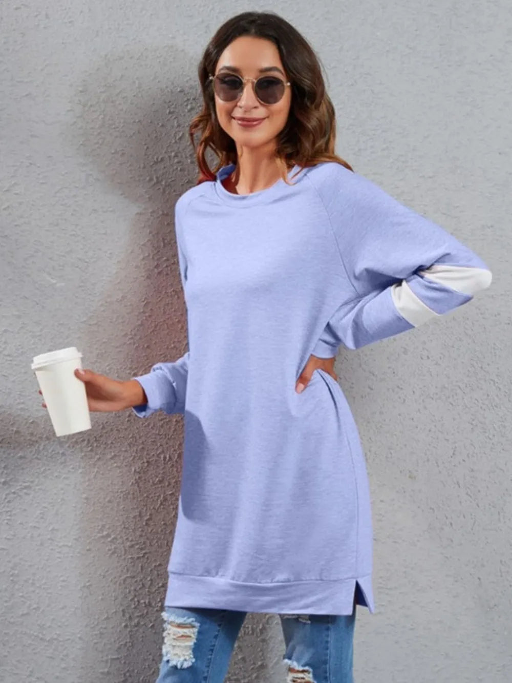 Light blue striped long-sleeve round-neck T-shirt with white sleeve stripes