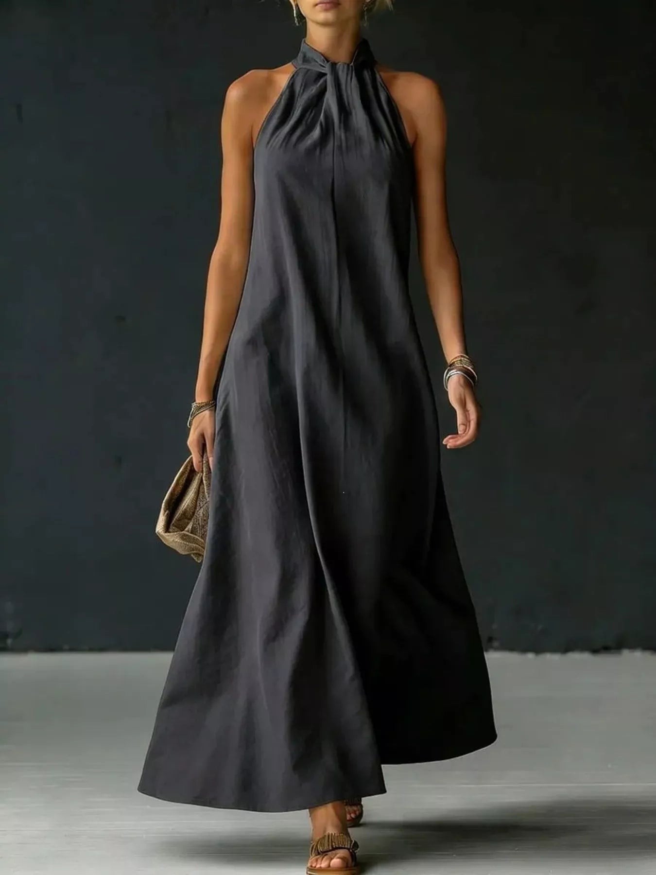 Black halter-neck maxi dress with gathered high neckline, sleeveless