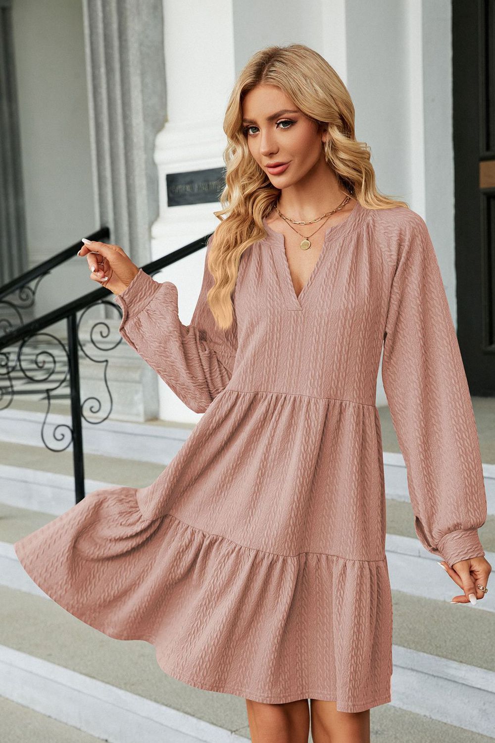 Dusty pink notched-neck long-sleeve mini dress with layered skirt and V-neck
