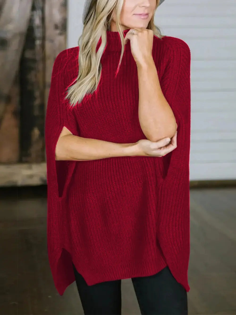 Burgundy turtleneck slit sweater with ribbed knit, long sleeves, and side hem split.