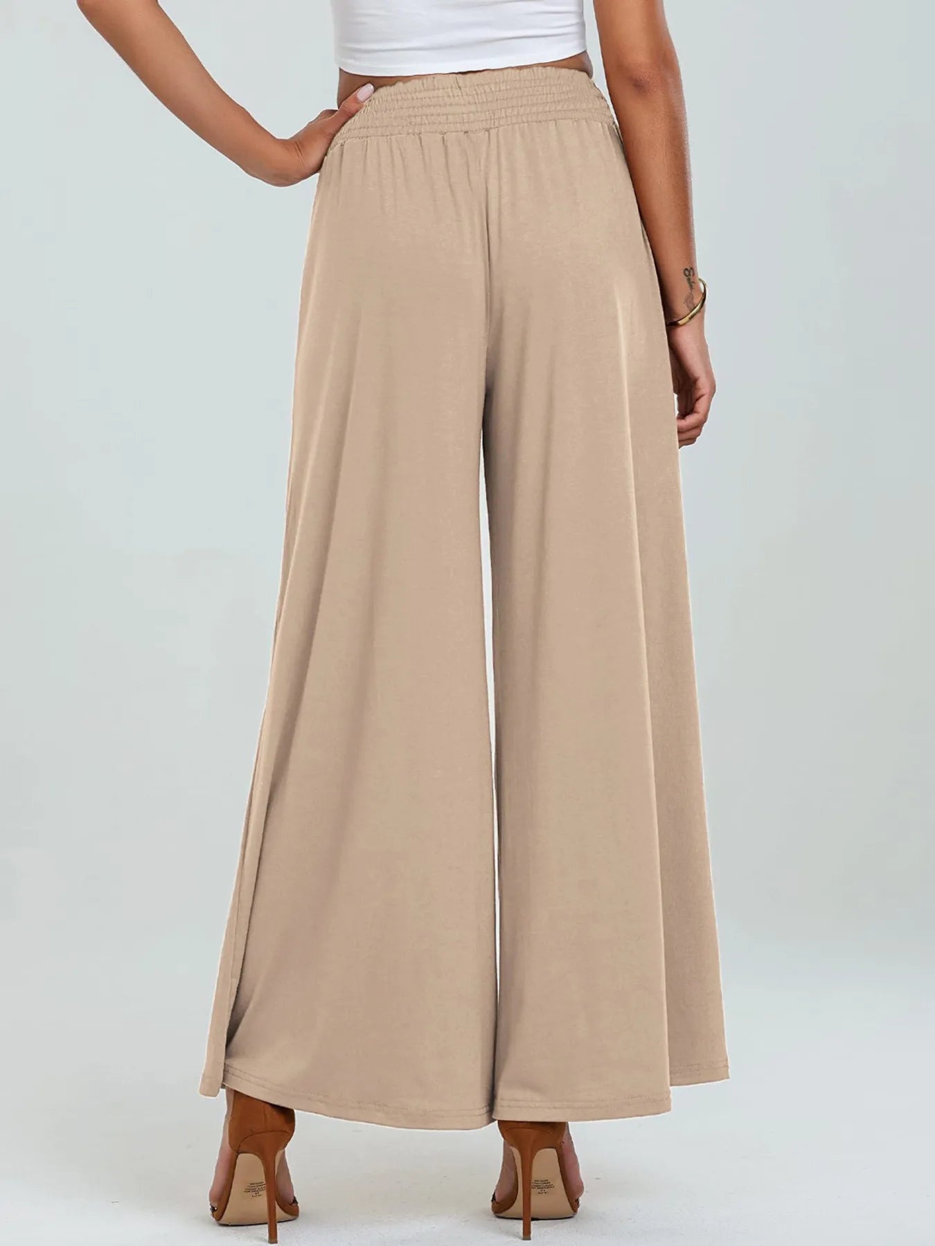 Apricot high-waisted wide-leg pants with elastic waistband and side pockets
