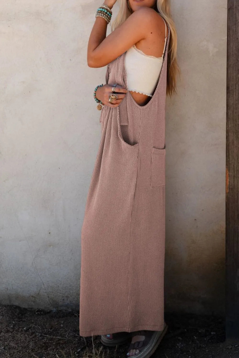 Dusty mauve wide-leg overalls with adjustable straps and back keyhole neckline