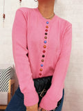 Pink button-front cardigan sweater with crew neck and multicolor detail buttons