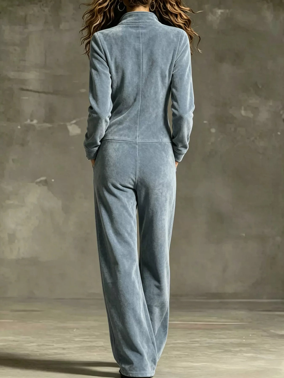 Light blue velour zip-up jumpsuit, back view with full-length legs