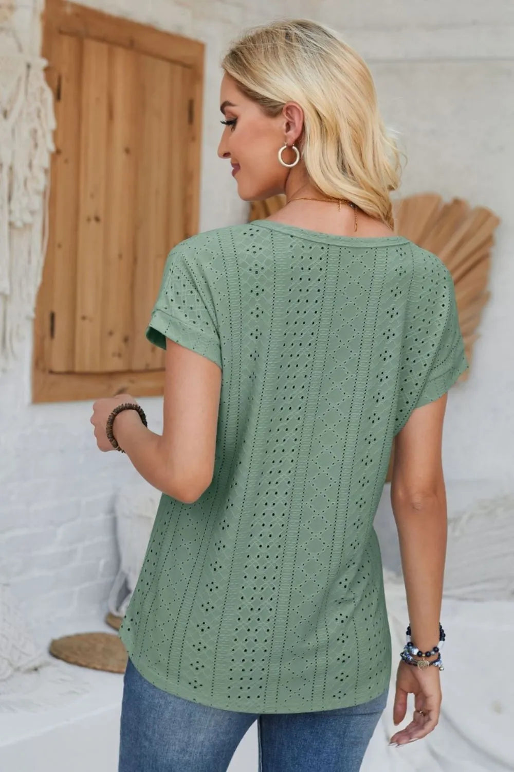 Sage green eyelet short-sleeve T-shirt, round neck, back view