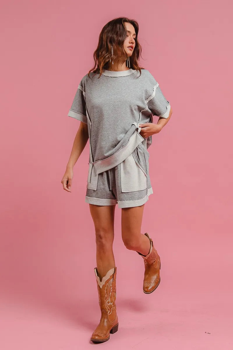 Heather grey French terry knit shorts with tie waist and side pocket details