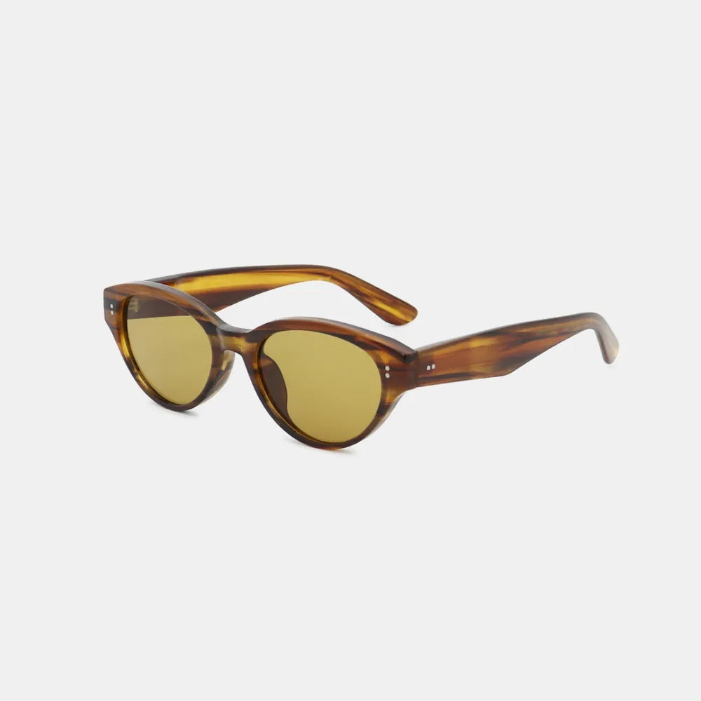 Brown polycarbonate cat-eye sunglasses angled view with round cat-eye lenses