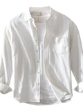 Men's white cotton button-up shirt with long sleeves, front buttons, and chest pocket