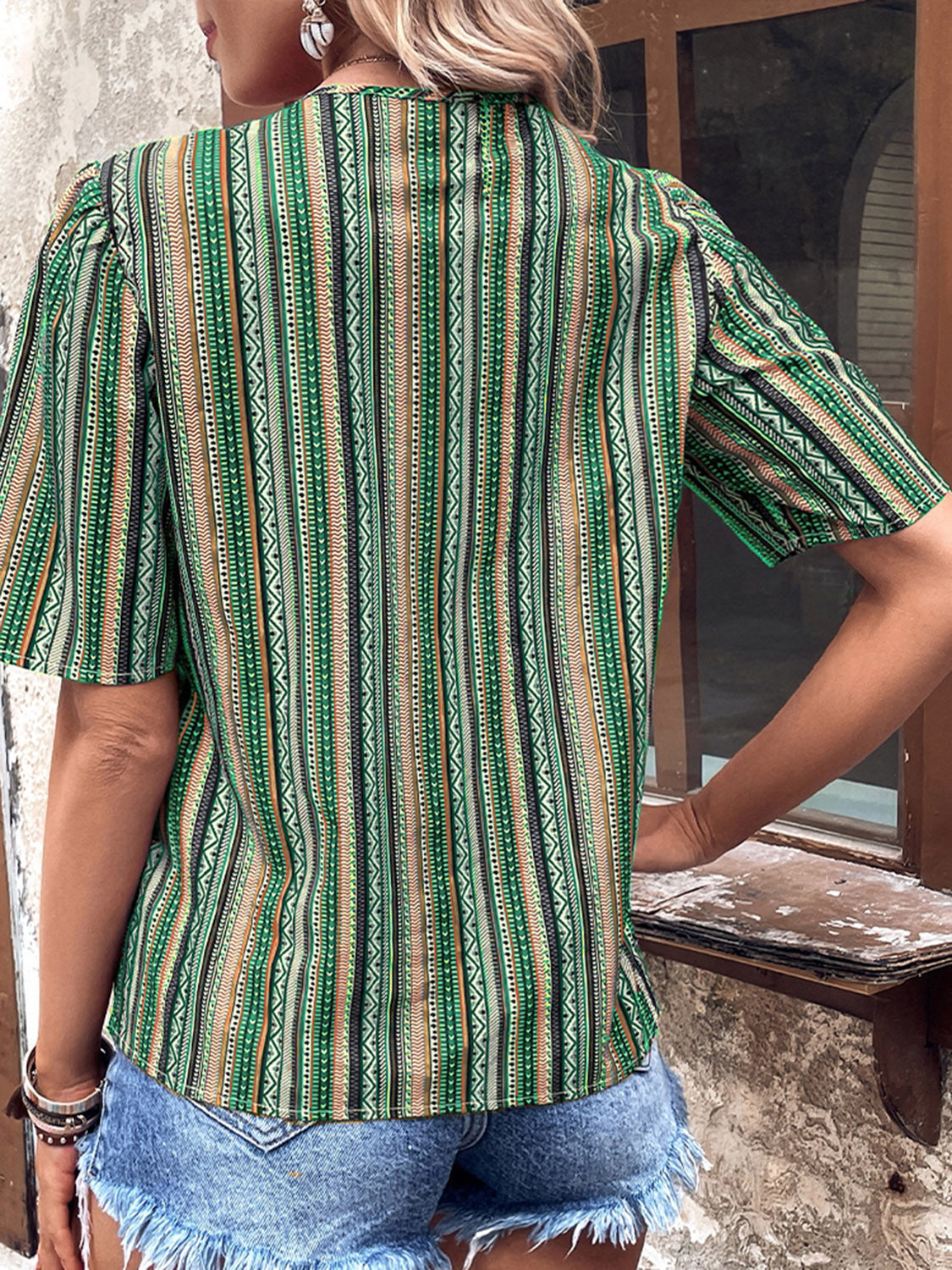 Shiny printed short sleeve top with V-neck and back yoke, green stripe pattern