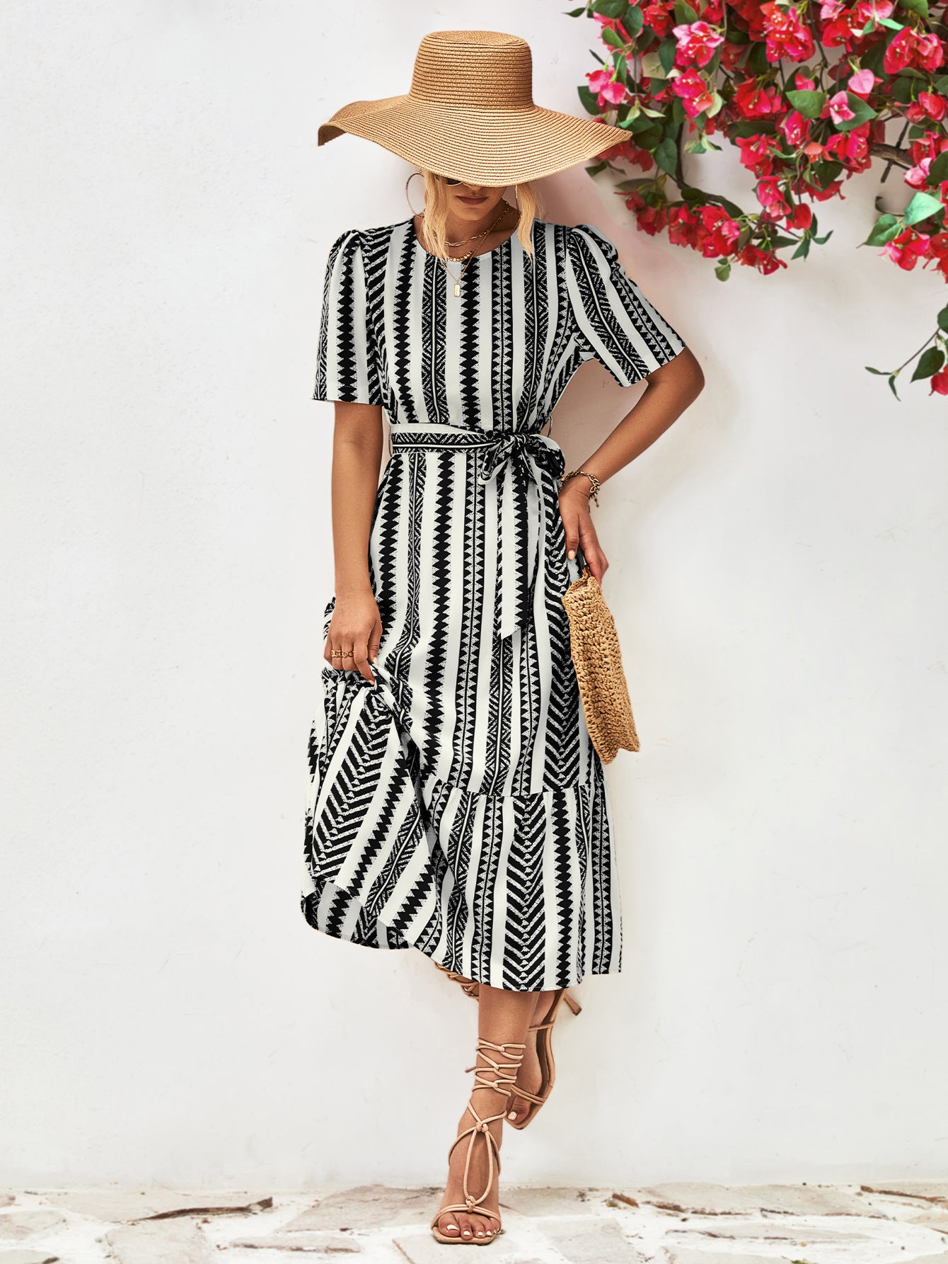 Striped tie-belt round-neck puff sleeve dress with black-and-white vertical pattern
