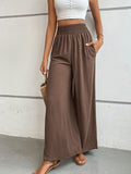 Brown wide-leg long pants with elastic waist and loose flowing fit