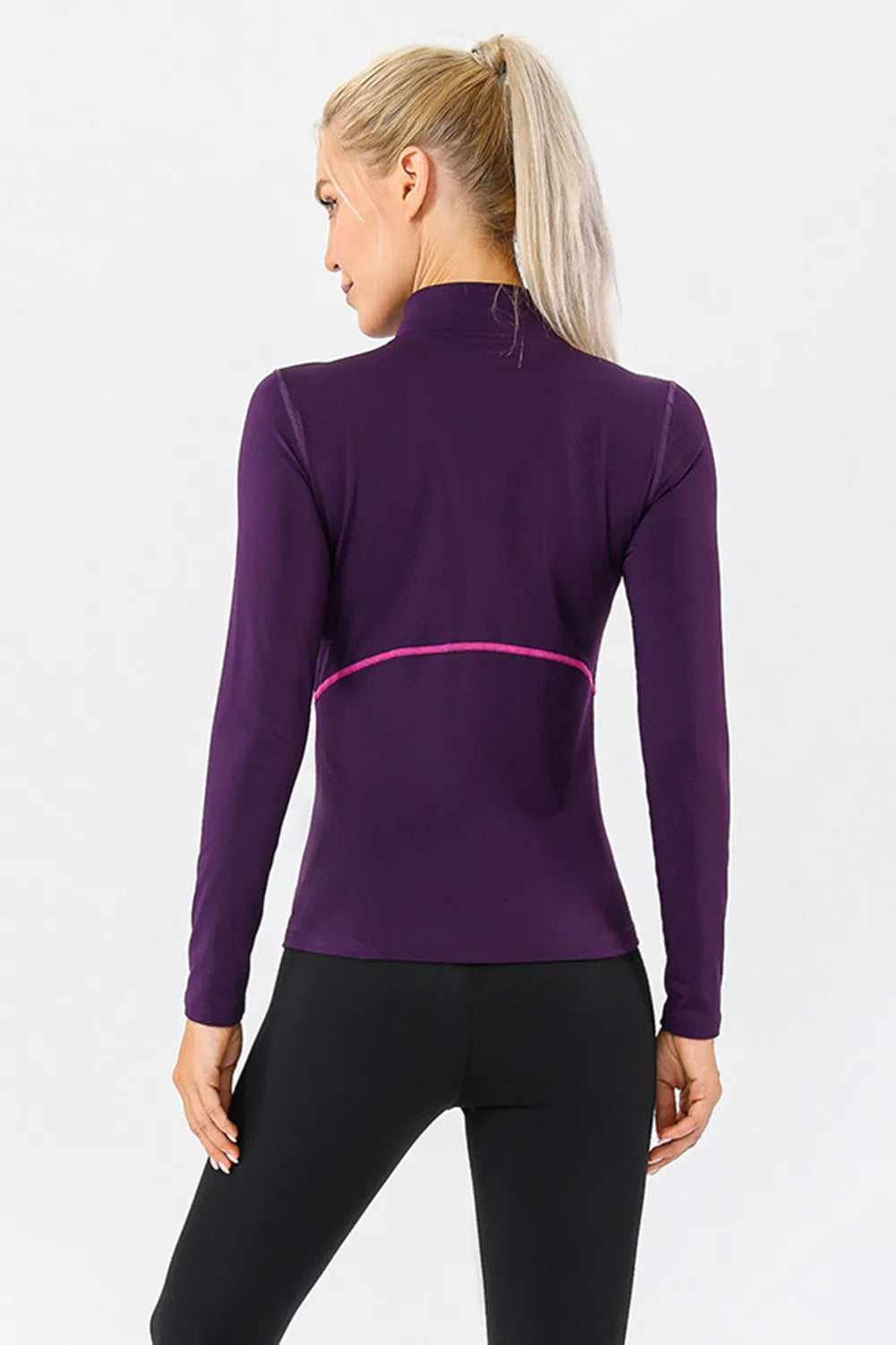 Violet mock neck quarter-zip active t-shirt, back view, with pink contrast seam lines