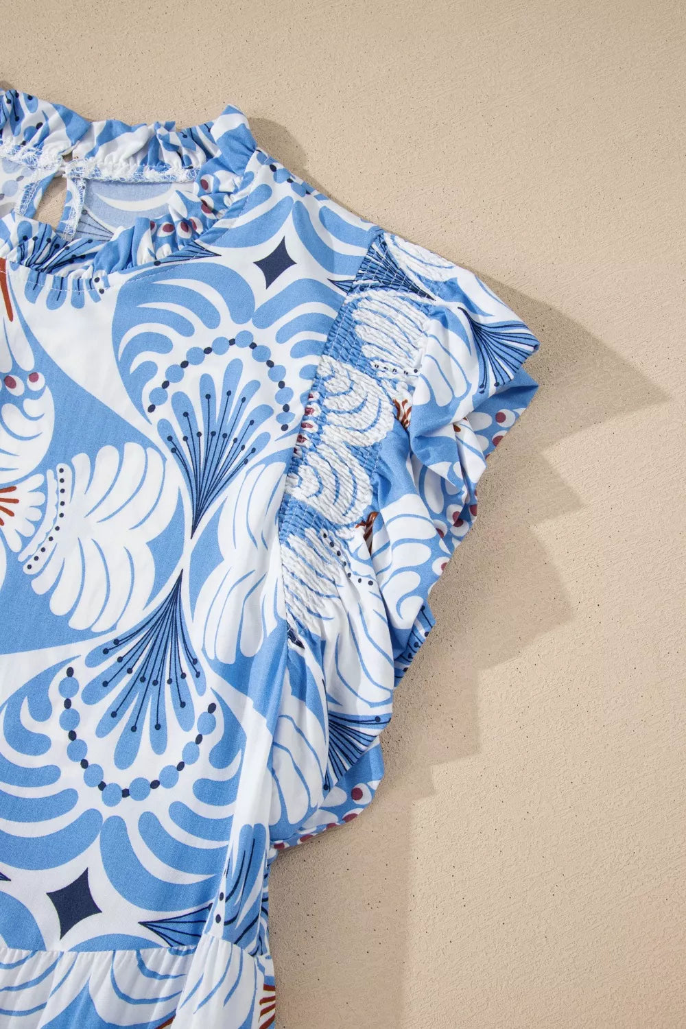 Cedar & Moore Tropical Botanic Print Flutter Sleeve Vacation Dress in blue and white with ruffled trim