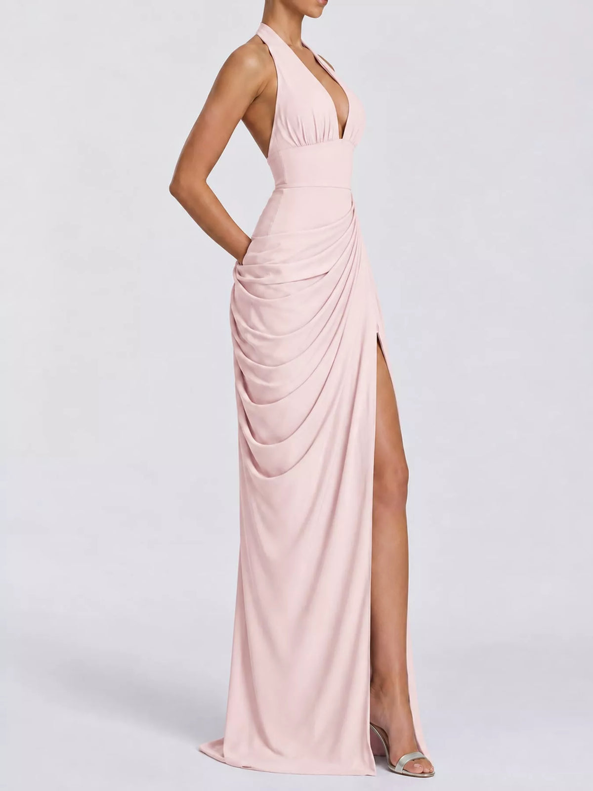 Pink halter neck maxi dress with ruched bodycon fit and high slit skirt