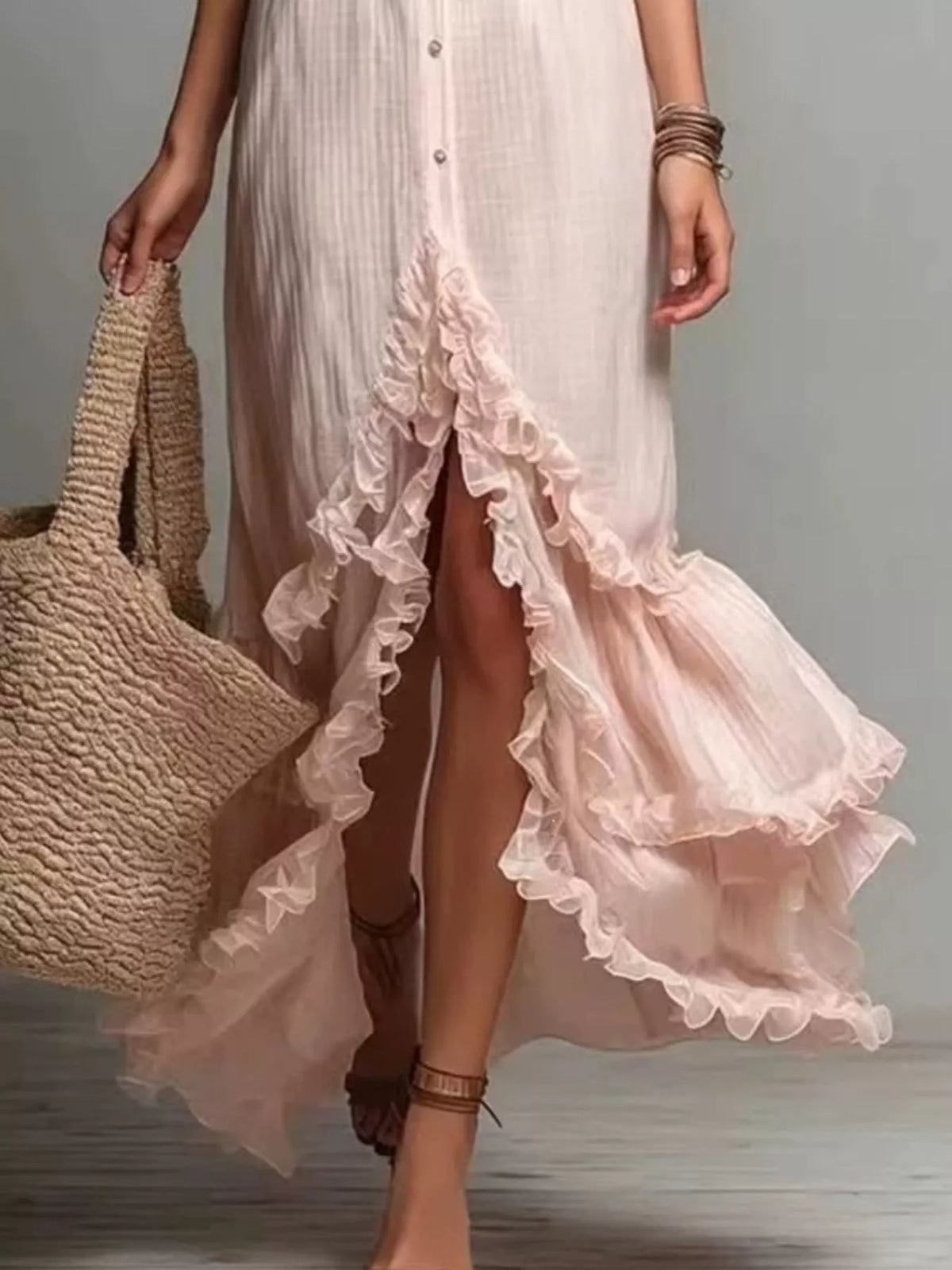 Boho pale blush maxi dress with layered ruffle hem and button-front bodice detail