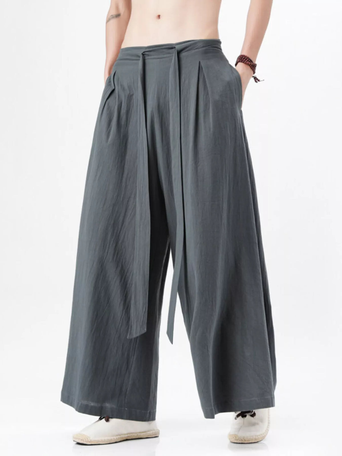 Gray wide-leg pants with gathered waistband and full-length wide legs