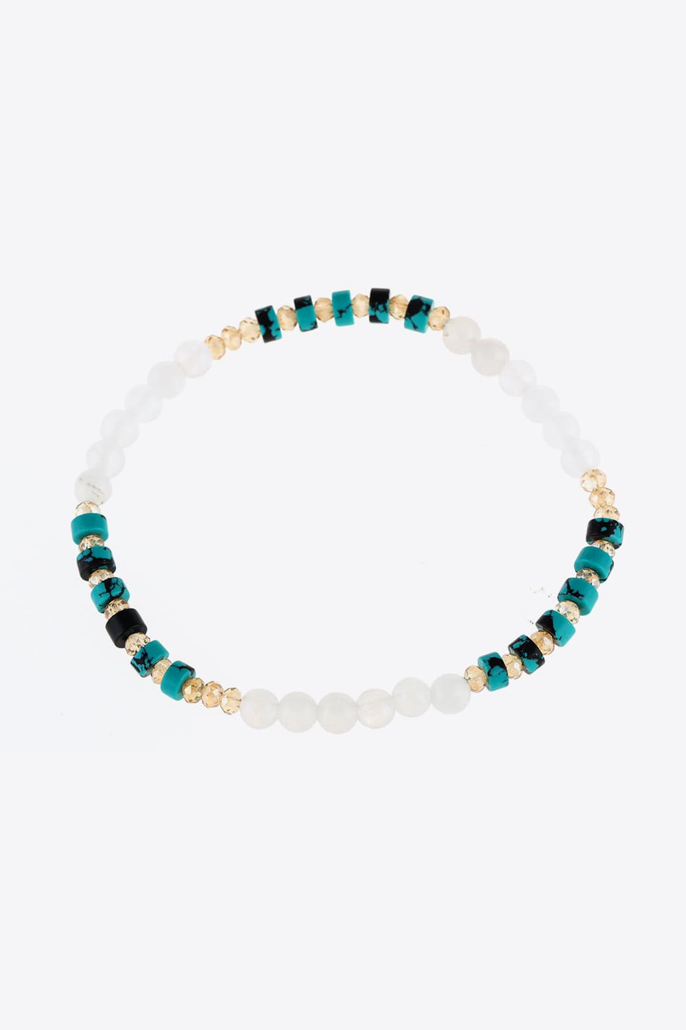 Crystal and natural stone bracelet with white beads and teal accents