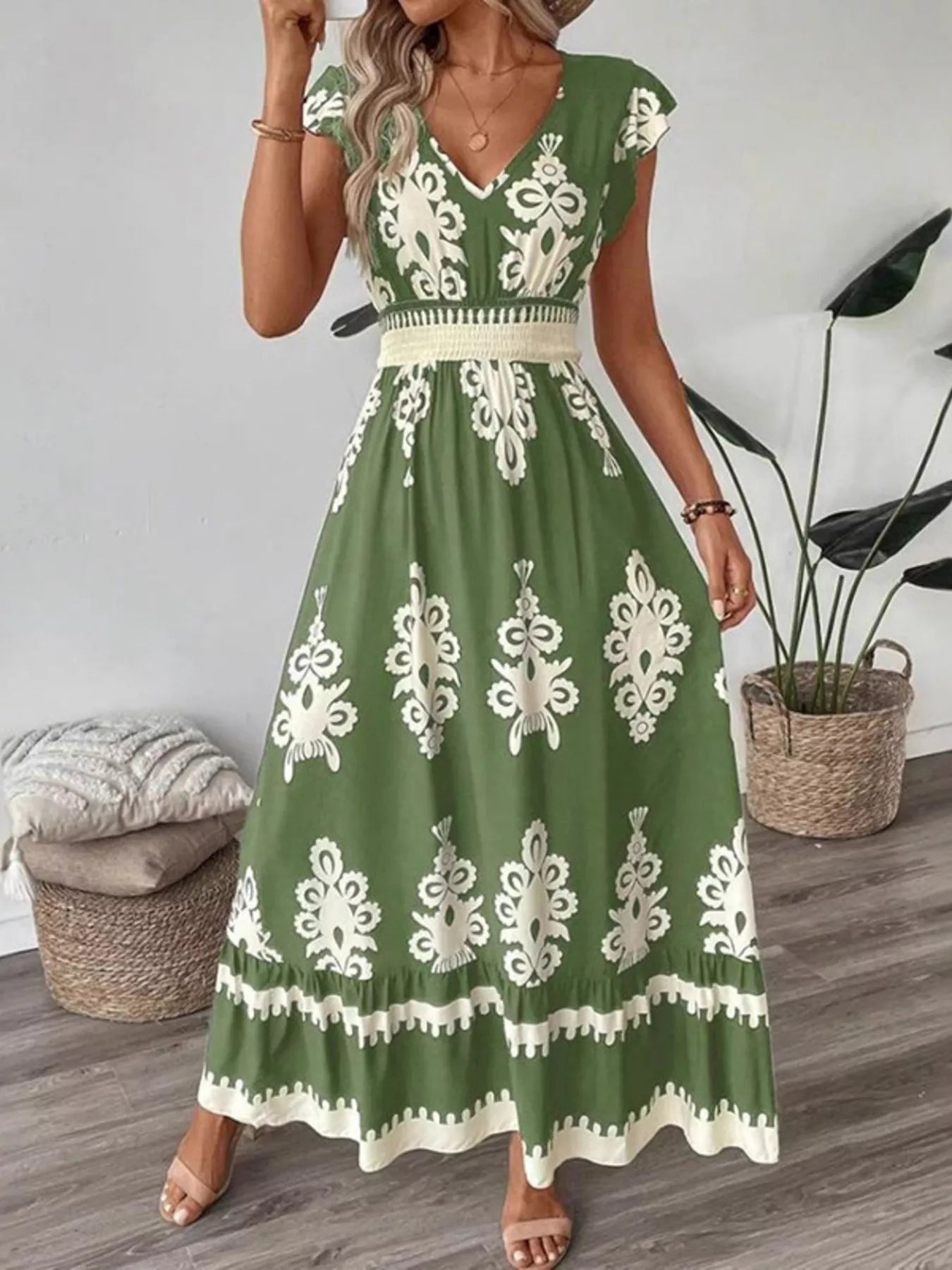 Moss green ruffled V-neck maxi dress with white floral damask print and tiered hem