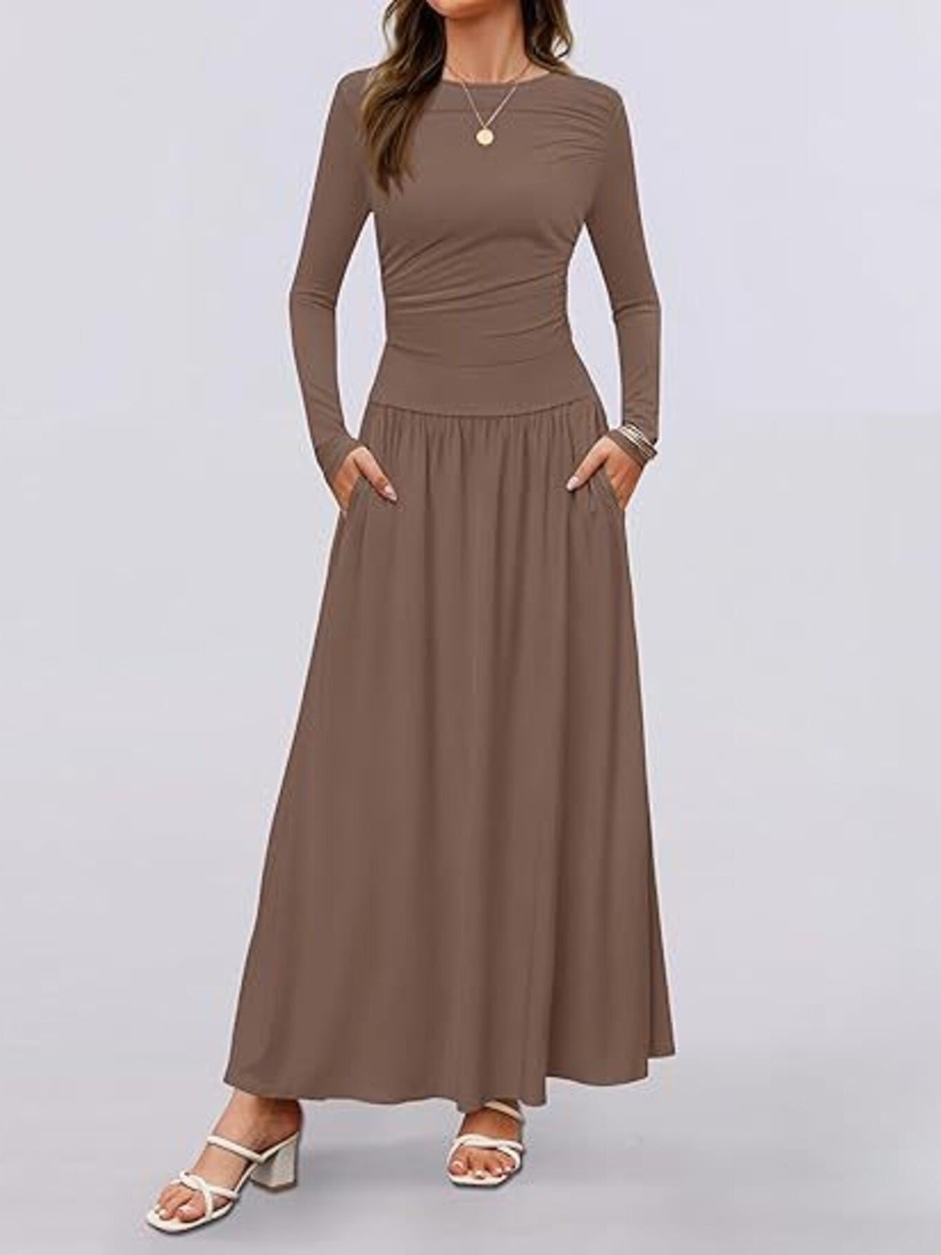 Long sleeve maxi dress in taupe with ruched bodice and gathered skirt, front view