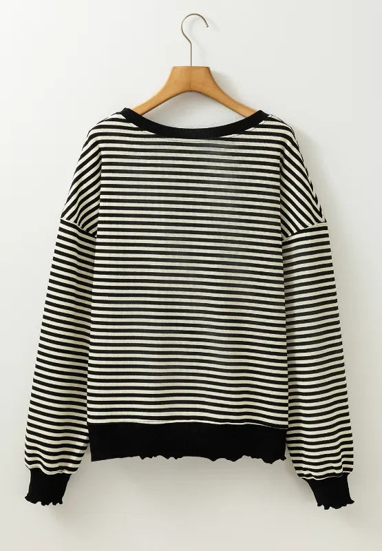 Black-and-white striped long-sleeve sweatshirt with round neck and ribbed hem