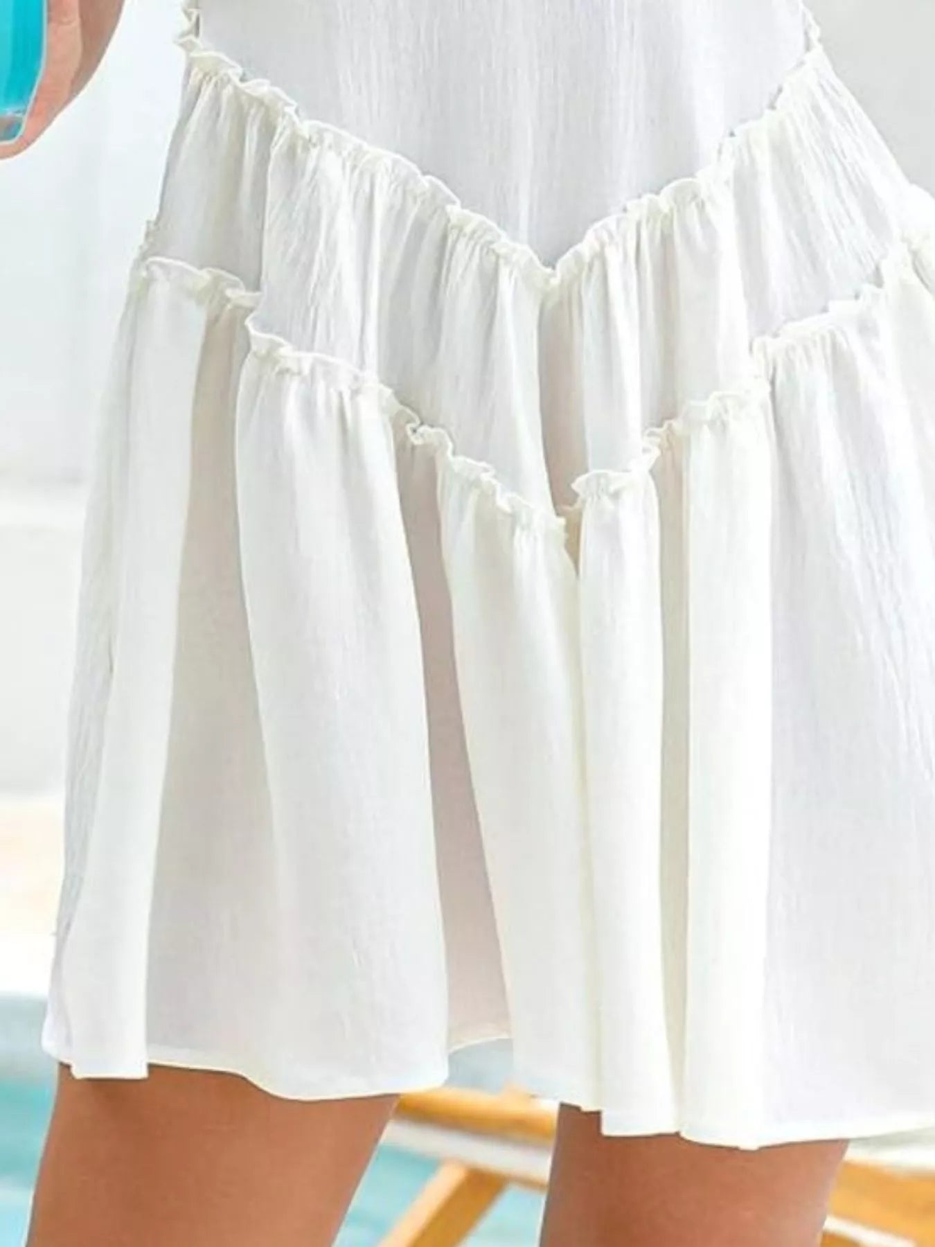 Round Neck Sleeveless Mini Dress by Trendsi — white fabric with frill and pockets