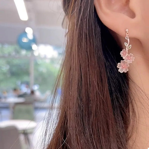 Blush pink flower drop earrings with asymmetrical dangling floral clusters on hooks