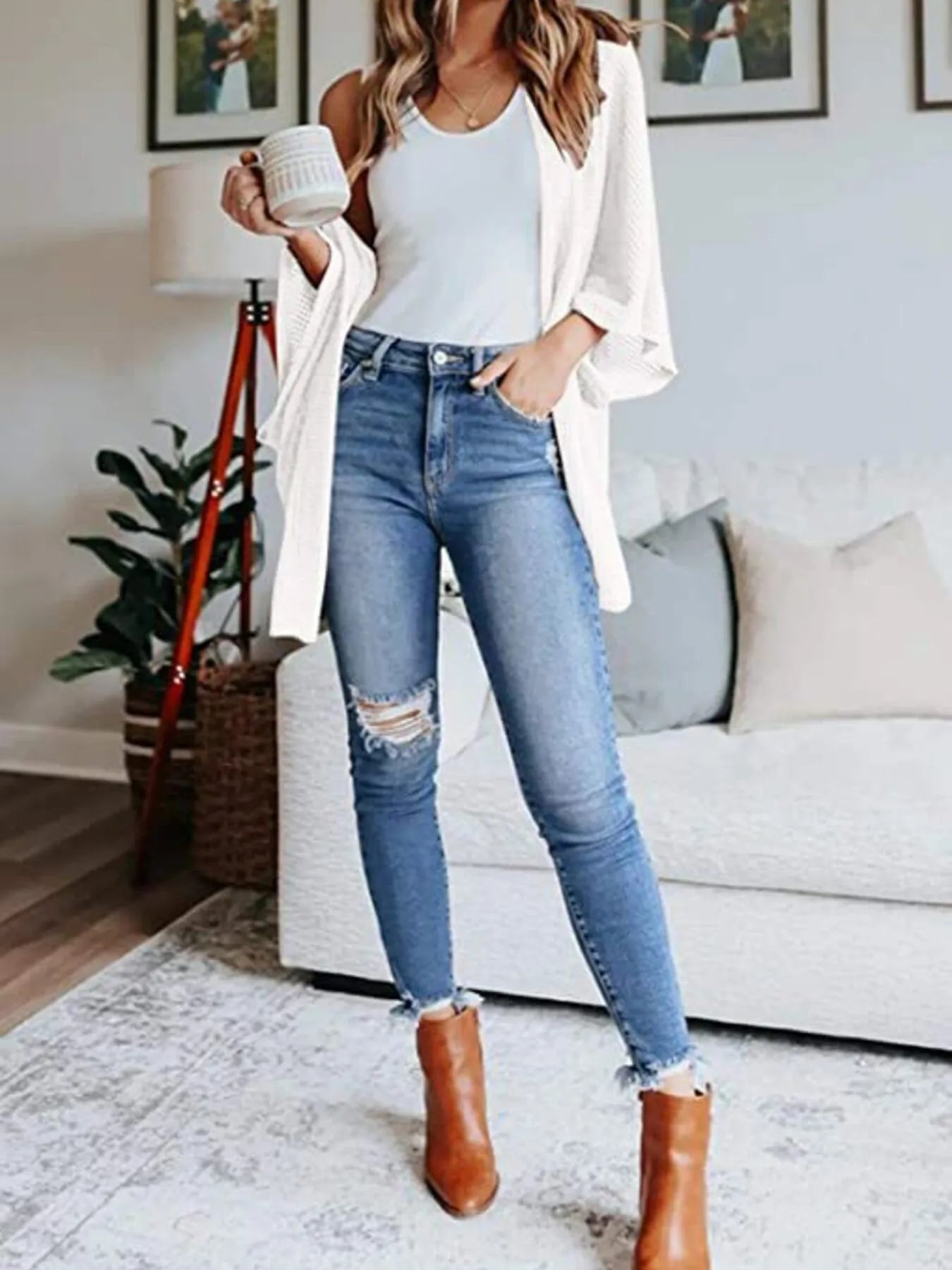 Waffle knit open-front cardigan over a white tank and blue jeans, white