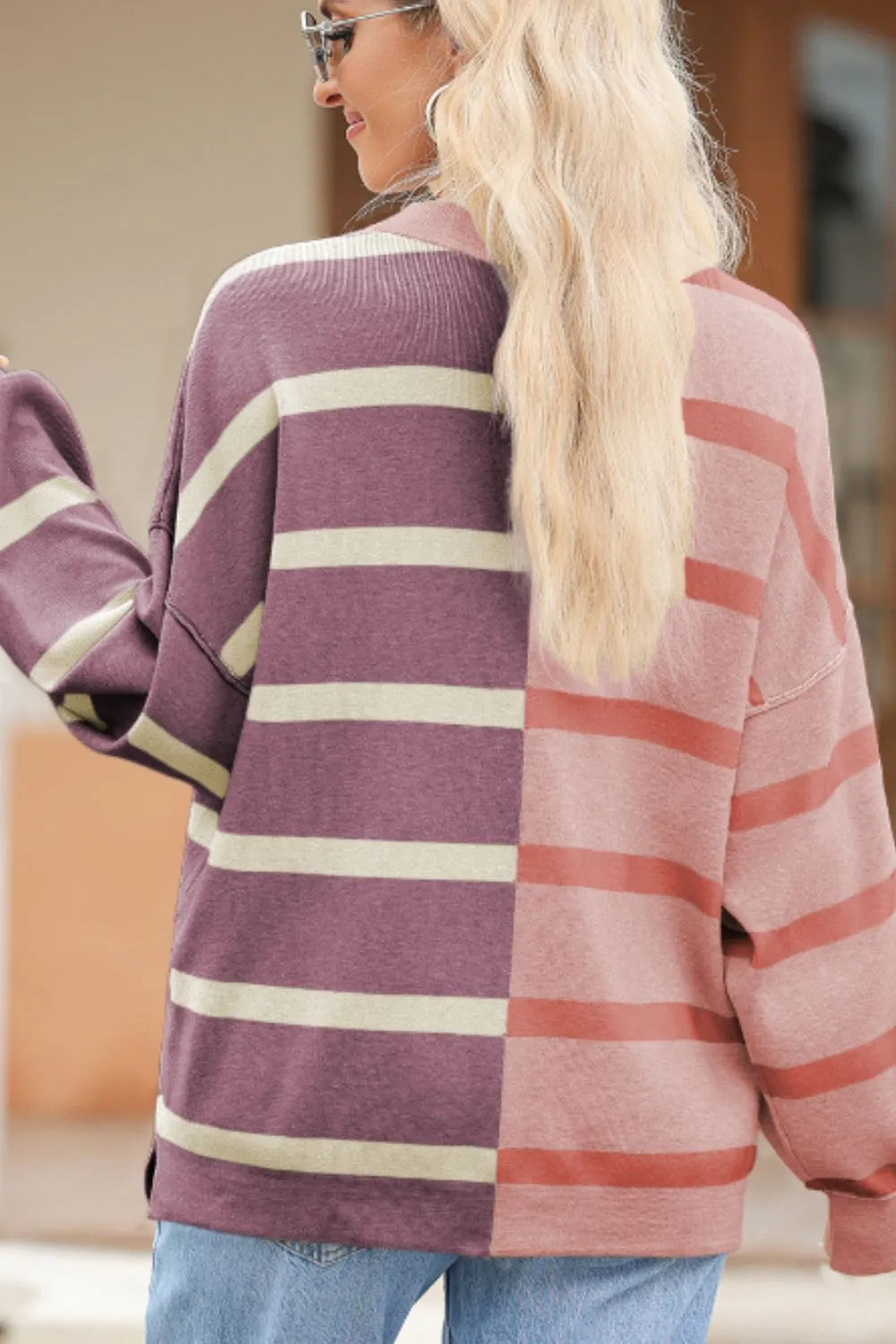 Dusty pink and mauve contrast striped long-sleeve sweatshirt, side view