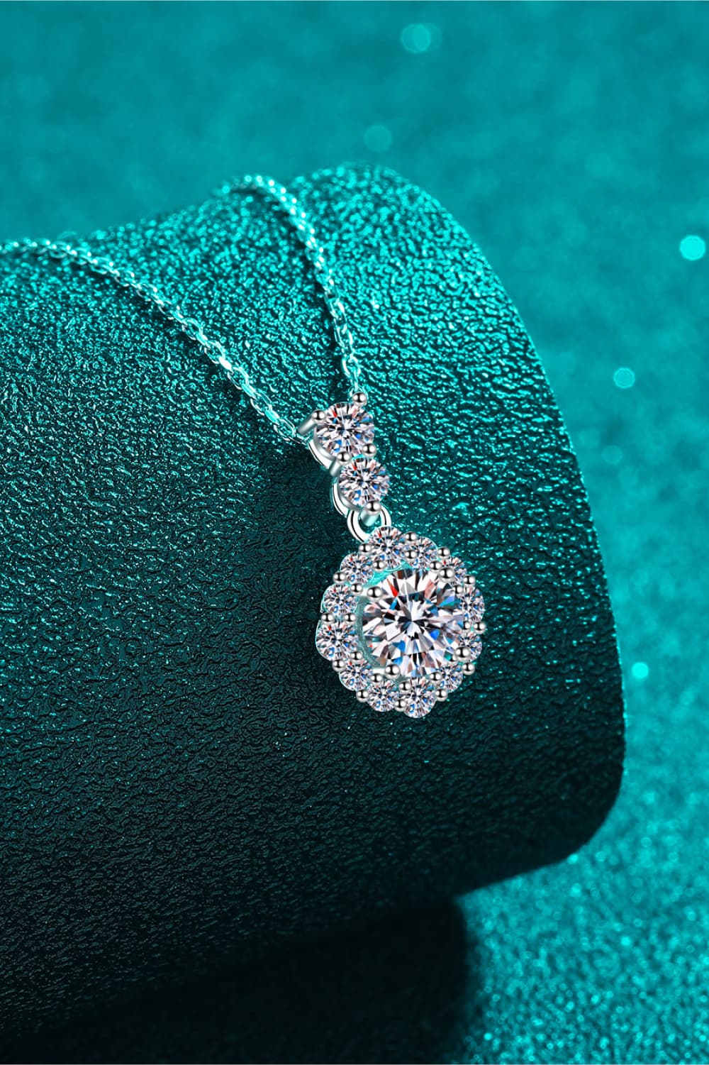 Sterling silver moissanite pendant necklace with round halo stones and small bail