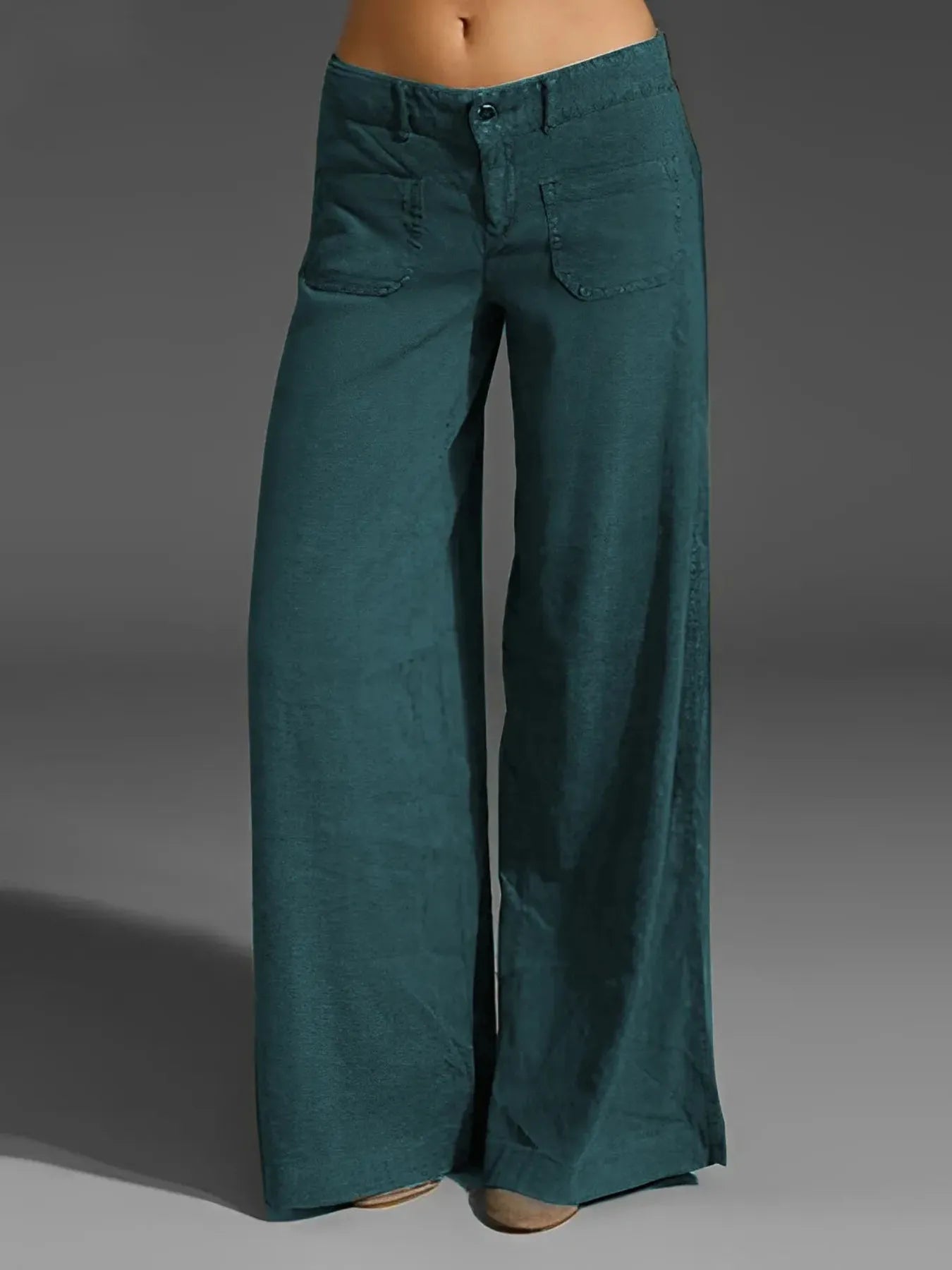 Teal wide-leg pants with pockets, button-front closure, relaxed legs