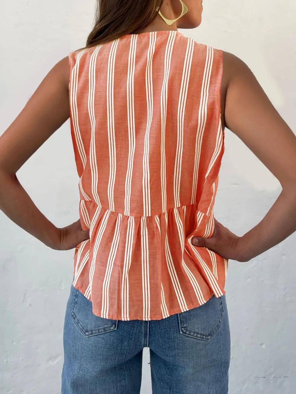 Striped round-neck tank top, orange with white vertical stripes, ruched tied back