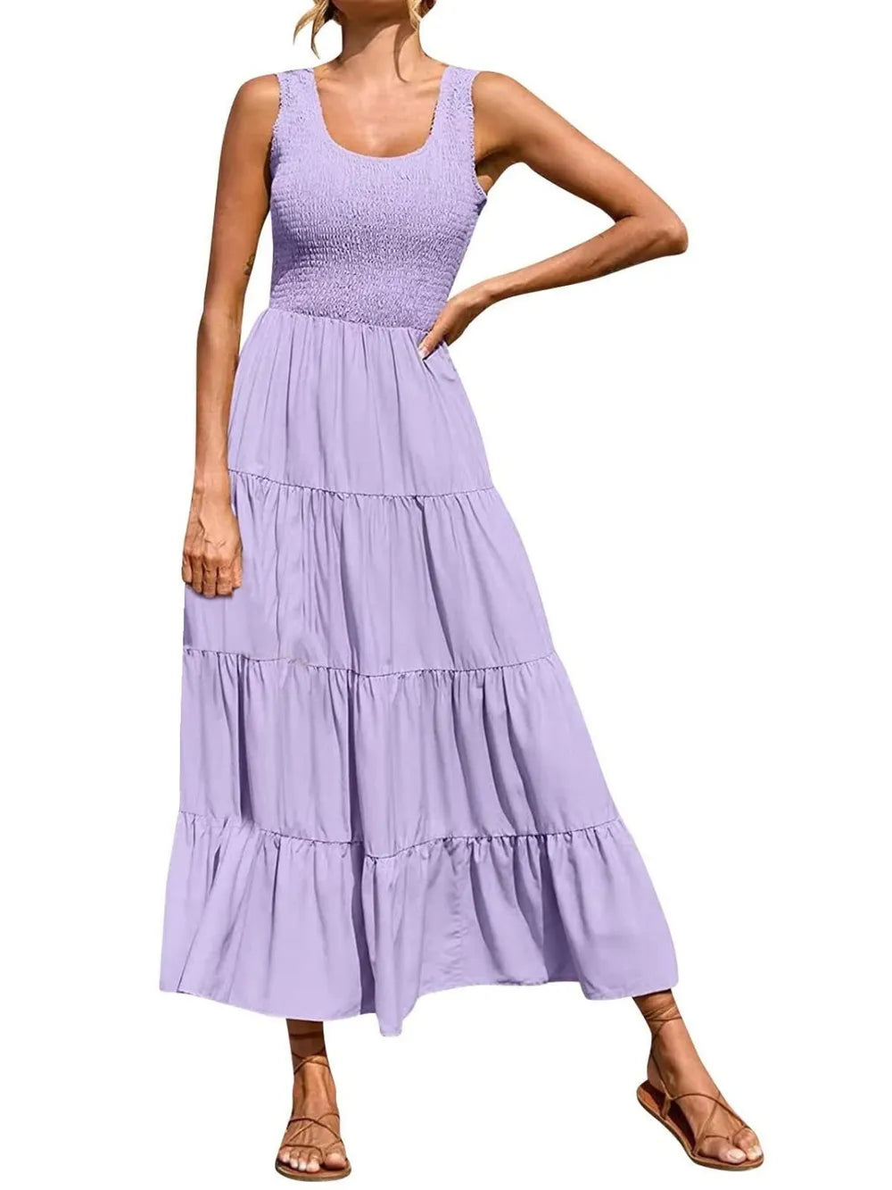 Tiered smocked wide strap dress in lavender with tiered ruffle skirt.