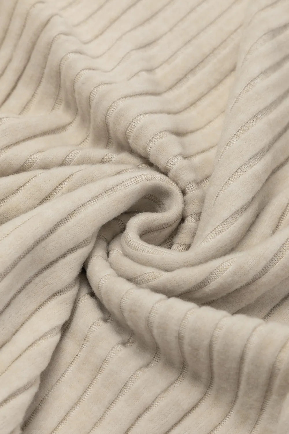 Beige ribbed knit wide-leg jumpsuit fabric close-up