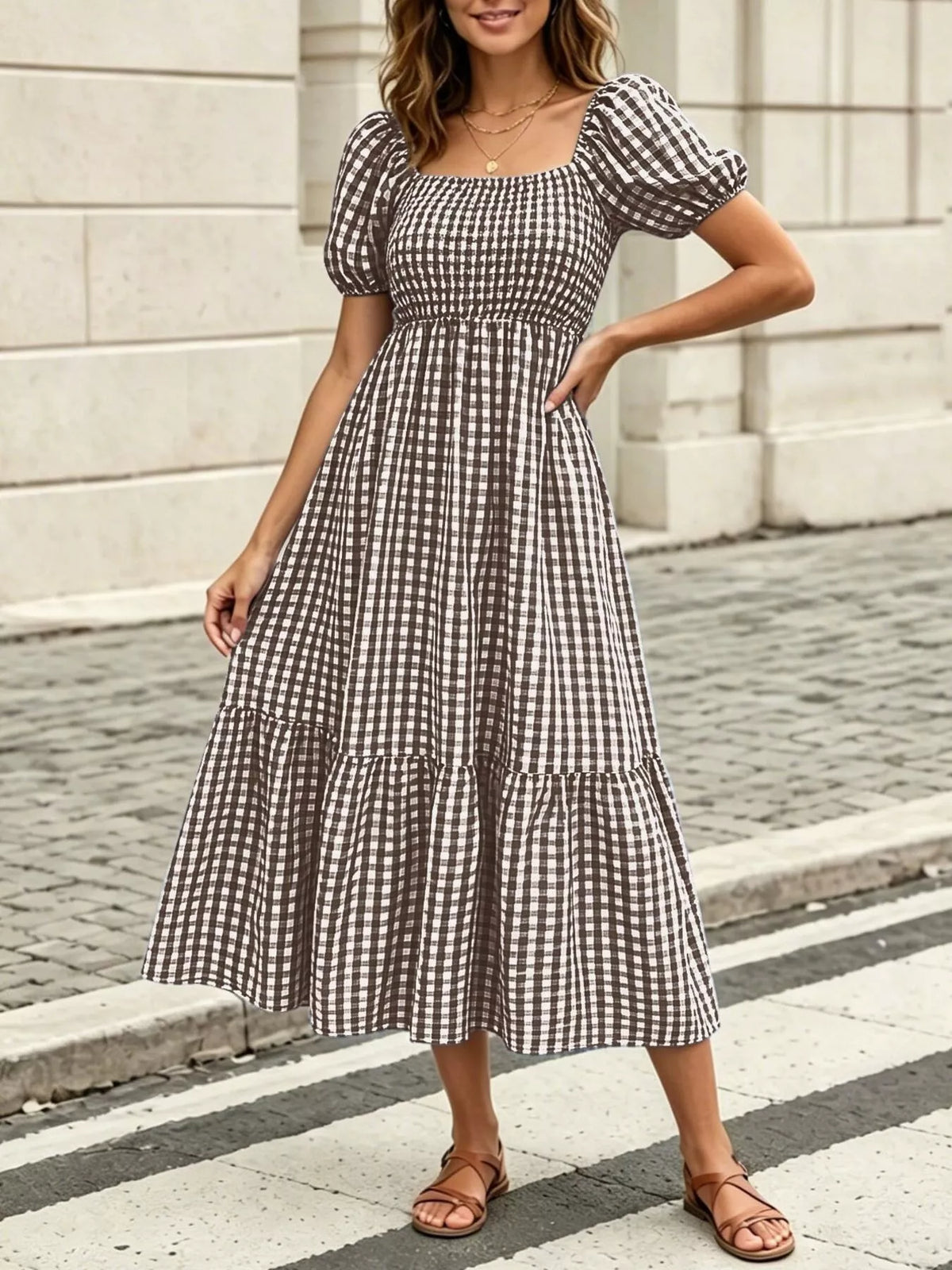Brown gingham puff-sleeve midi dress with square neckline and tiered ruffle skirt