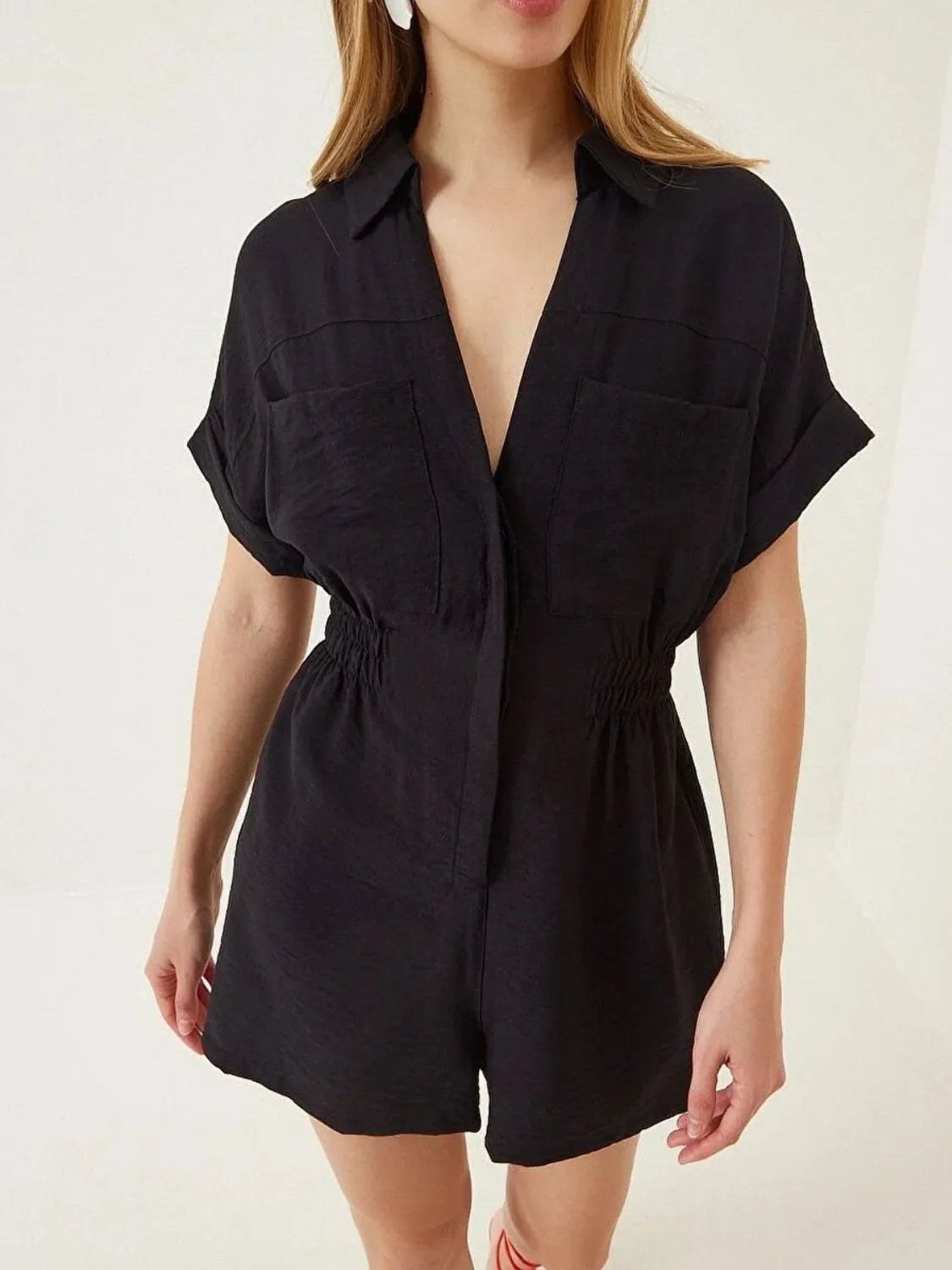 Black collar short-sleeve romper, V-neck with button placket, chest pockets, cinched waist
