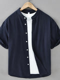 Navy blue plus size button-up short sleeve shirt with button front placket