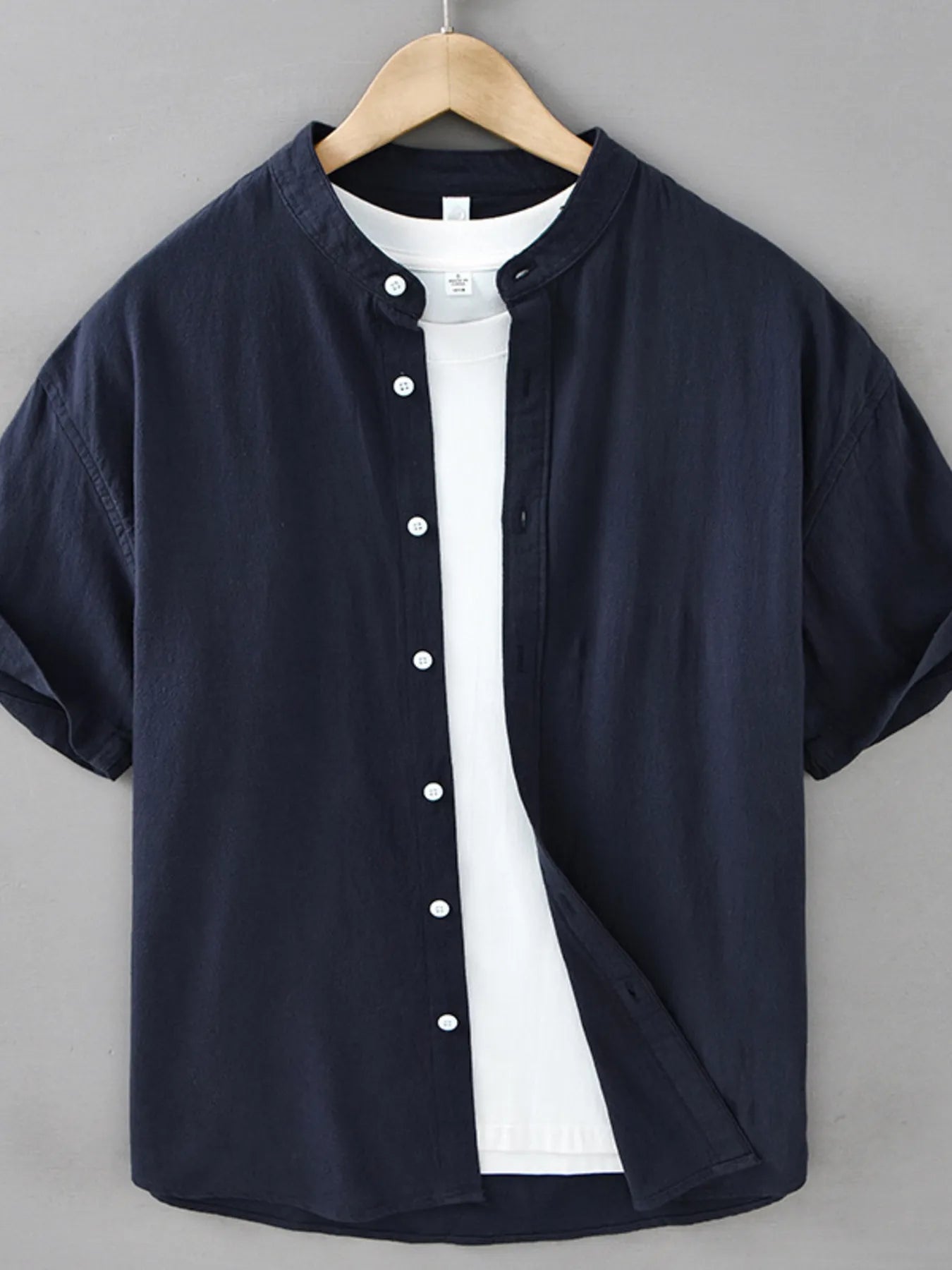 Navy blue plus size button-up short sleeve shirt with button front placket