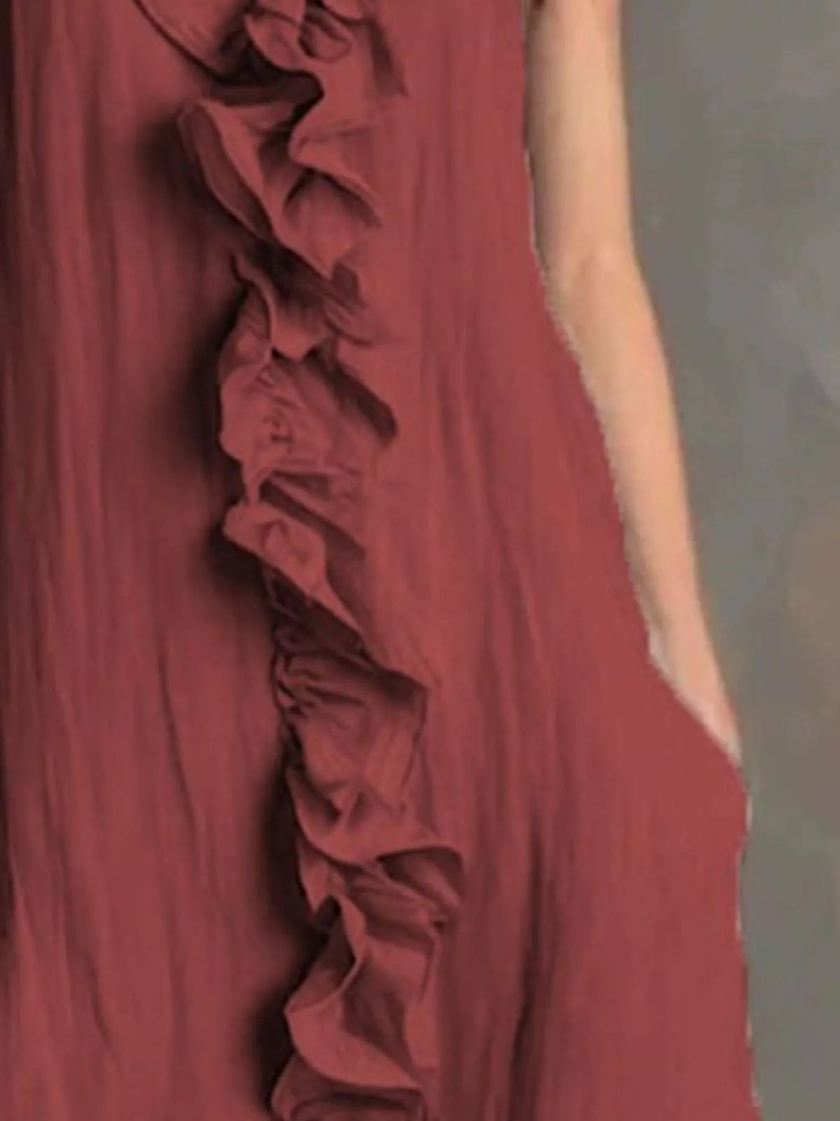 Burgundy sleeveless V-neck ruffle midi dress close-up of tiered ruffles