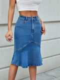 Blue denim high-waist mermaid hem skirt, contrast seams and button front.