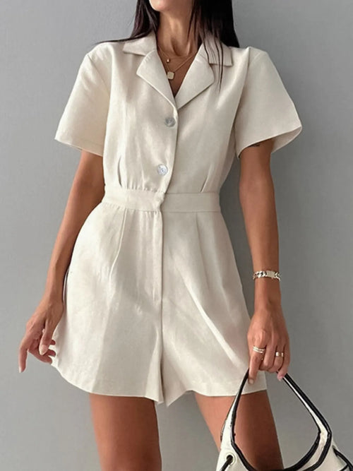 Beige short-sleeve button-front romper with lapel collar and waist seam