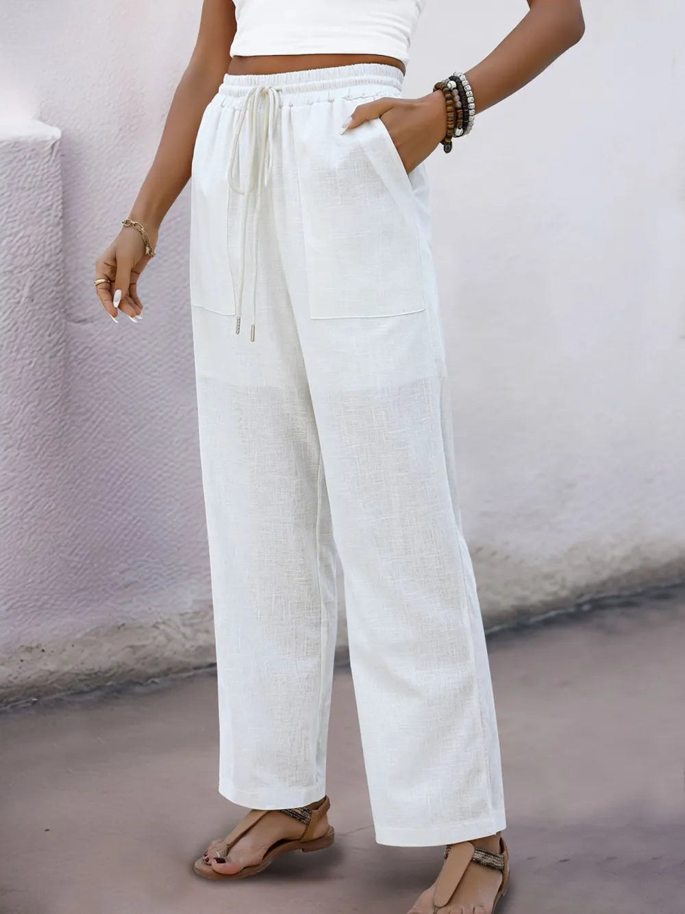White wide-straight pants with drawstring elastic waist and side pockets
